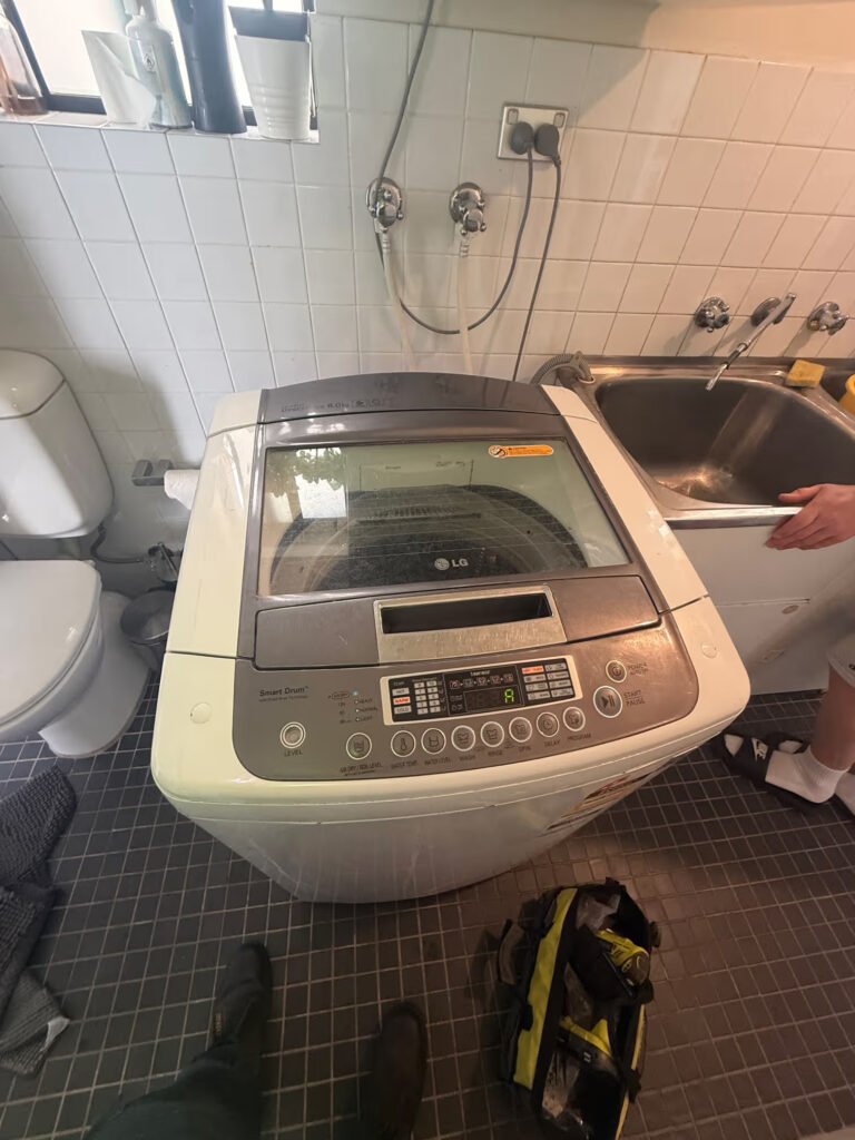 LG top load washing machine during a repair service in Clemton Park NSW 2206